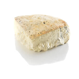 The image presents a piece of our artisanal Allgäu cheese, crafted using traditional methods and certified organic milk.
