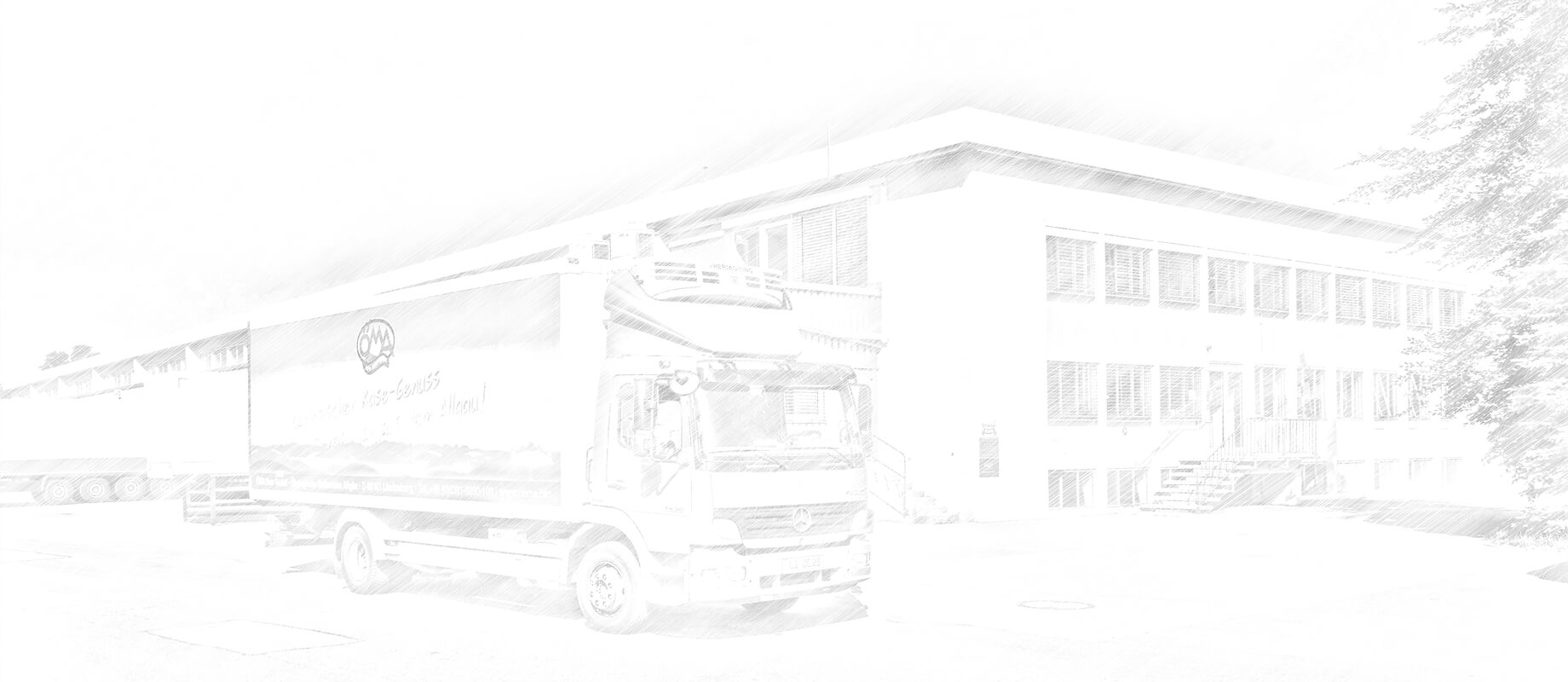 The image shows a lorry in front of a large commercial building.