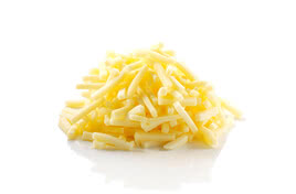 The image presents a generous heap of freshly grated Allgäuer Bergkäse, showcasing the rich, full-bodied aroma and fine granulation that define this traditional Alpine specialty.